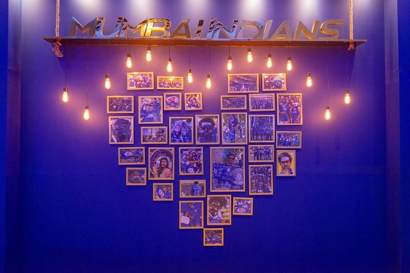 The wall decoration with images of family members of the Mumbai Indians squad